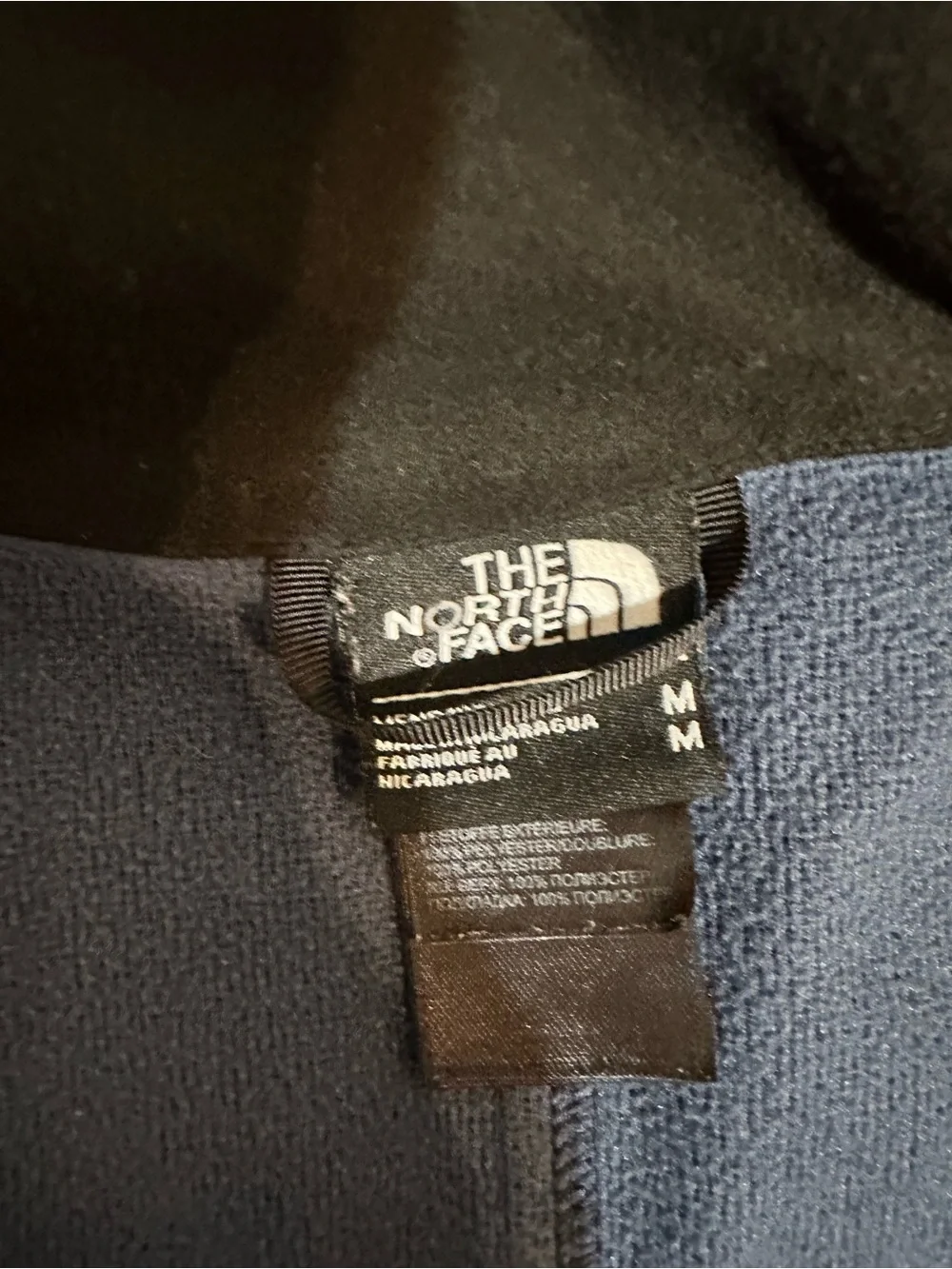The North Face Men's Navy Jacket with Blue Zipper